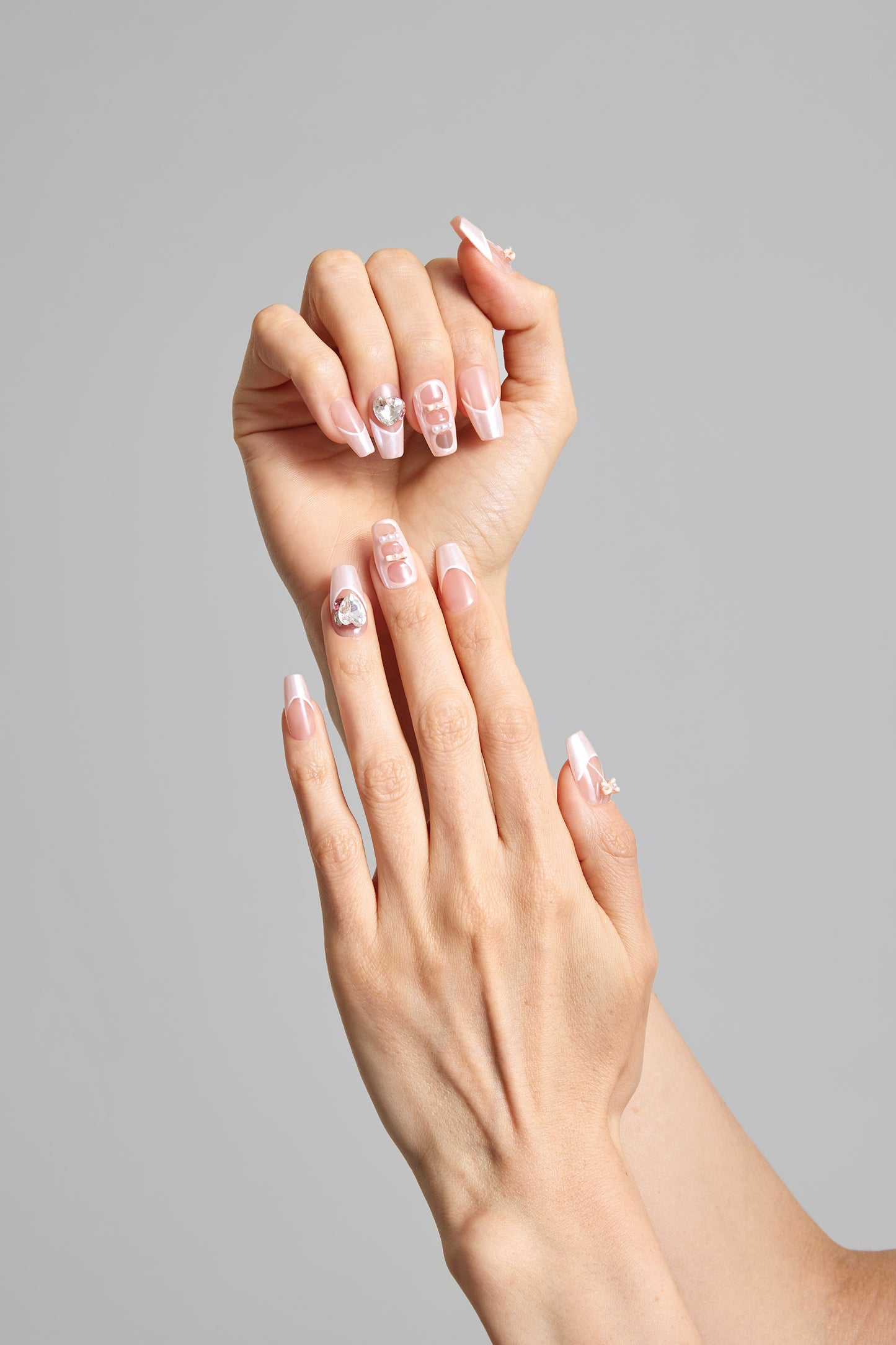 Blushing Elegance Adorned Nails