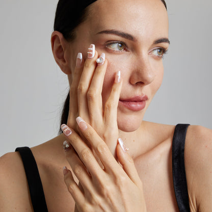 Blushing Elegance Adorned Nails